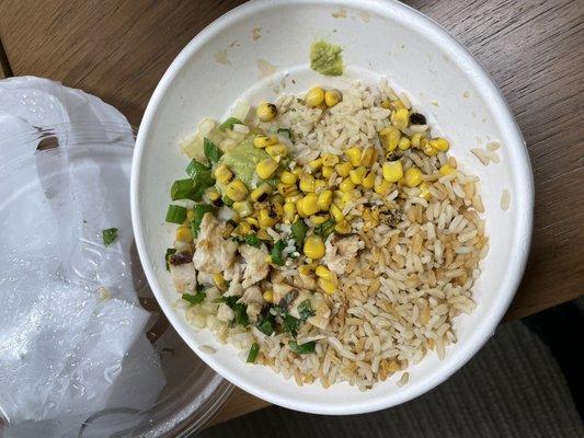 chicken bowl with brown rice green onion and fire roasted corn