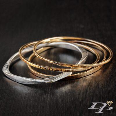 Handmade 14k yellow gold and sterling silver bangles