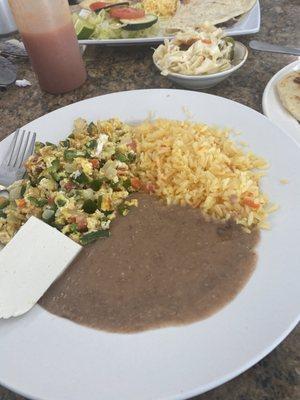 Huevos and rice and beans