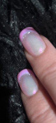 Natural base, ballet slipper pink French tip, dusted in pink chrome and silver accent line.