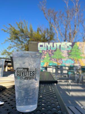 Rooftop patio, collectible cups, and a beautiful Sean Vali mural.