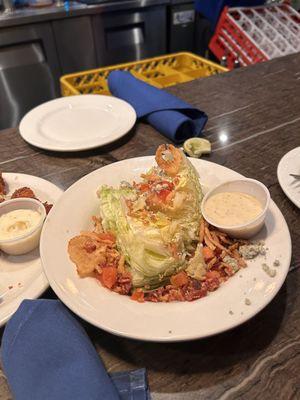 Wedge salad available on the happy hour menu.