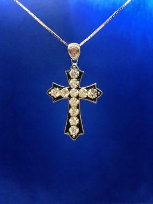 Gothic style cross set in black enameling with a total diamond weight of 2.50 carats