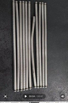 Bent and different size pushrods.