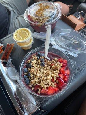 Ginger shot. Blueberry strawberry coconut milk and granola açaí bowl