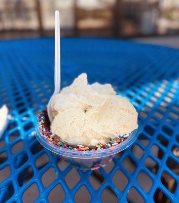 Banana cream pie and coconut cream pie in a chocolate sprinkle waffle bowl.