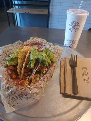 Three decadent hard-shell tacos with pico de gallo and guacamole  on top. Yummy! The lemonade  was tantalizing to my taste buds also.