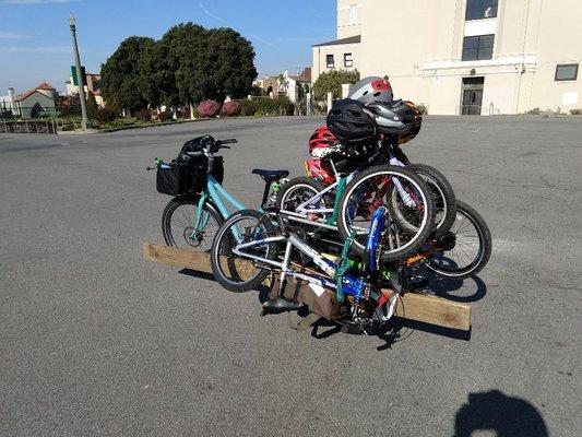 The group bike workshop loaded onto an electric assist cargo bike.