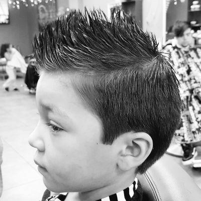 Regular kids haircut combed as a mohawk