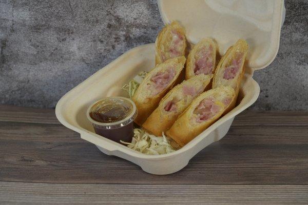 HAWAIIAN ROLL
 This fun and twist of cheesey #mozzarella, ham, and #pineapple. Yes, pineapples belong in egg rolls too.  Comment down be