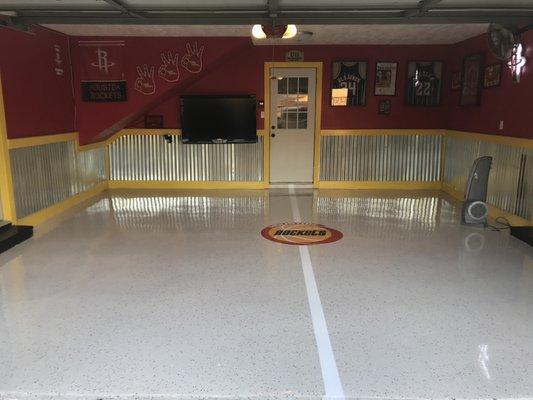 Rockets themed epoxy floor to finish rockets theme garage! Go Rockets!