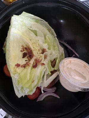 Sad Pitiful Looking Wedge Salad! Looks NOTHING like the picture on the online menu or what I usually order. SMH