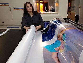 Beth printing Light Jet prints.