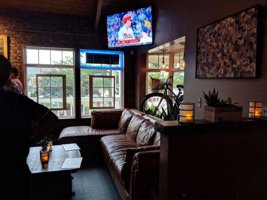 Cozy Couch seating at bar area.