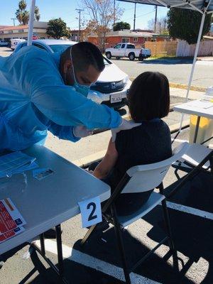 Mom getting the corona virus vaccine