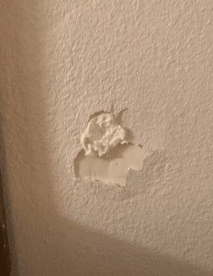 Damaged Wall from door knob.