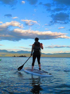 Enjoy the stillness of Flathead on a paddle board tour.