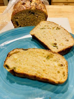 Sliced and buttered jalapeño cheddar bread