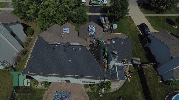 Bolingbrook, Illinois roofing system getting installed after a serious wind/hail storm.