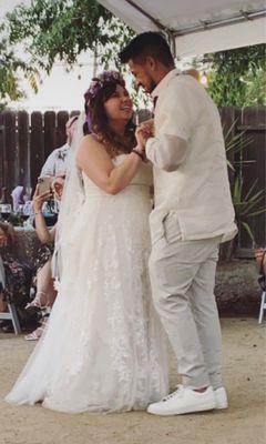 My dress with the train bustled up during our first dance