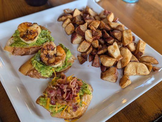 Avocado on crostini, one with bacon and cheese, two with grilled shrimp. Roasted potatoes.