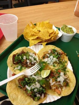 Tacos on corn. Chips and guac. Delicious!!