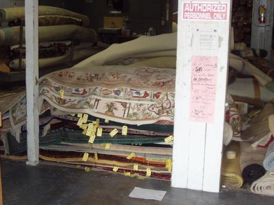 Rugs waiting to be clean.  We can clean any type of rug.