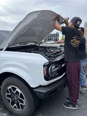 Ernesto & Team installing my new hood!