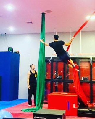 We use silks to practice grip strength while getting a good workout in. Teen, adult,& women classes offered weekly.