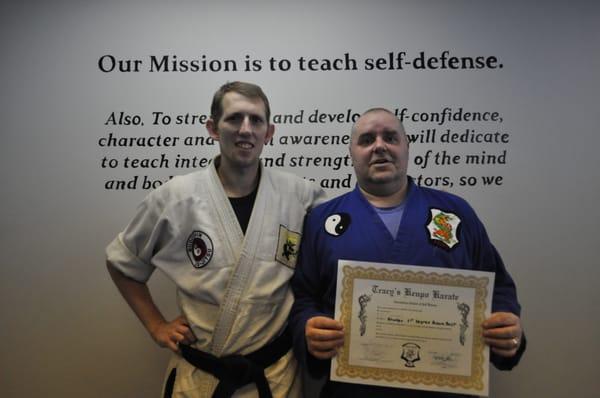 Congrats! on E.J.'s Black Belt test