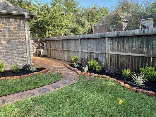 Walkway and flower beds