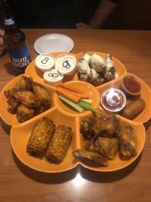 Buffalo mild, Hawaiian, and Parmesan wings. Deep fried corn and mozzarella sticks. Yum!