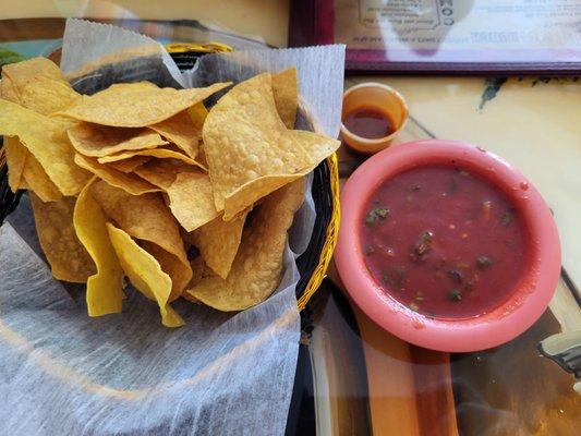 Complimentary tortilla chips & salsa.