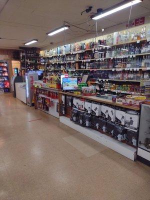 Front counter with many different choices of Liquor. Vodka tequila cognac and special bottles.