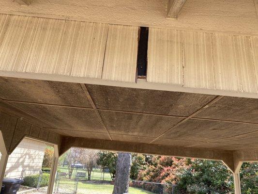 Damaged siding on carport another view