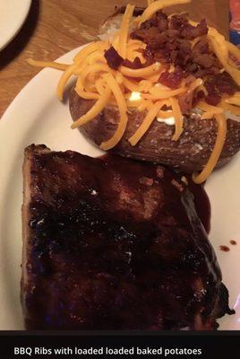 Bbq Ribs with loaded sweet potatoes