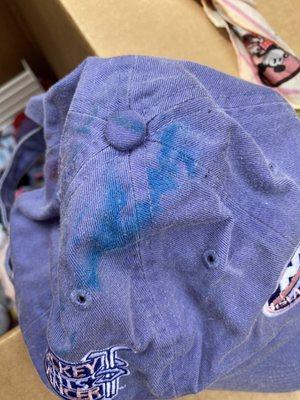 Another hat ruined by dye from Another item in box from extensive water