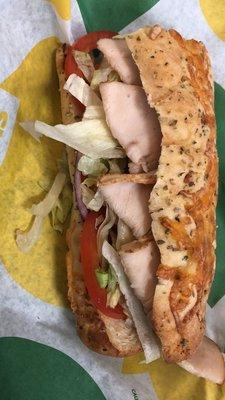 Italian herb and cheese bread, turkey, provolone, lettuce, tomato, onion, honey mustard