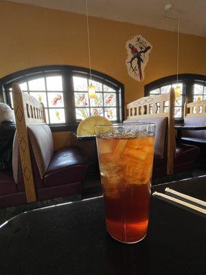 Interior view of Los Dos Amigos Fiesta with ice tea.