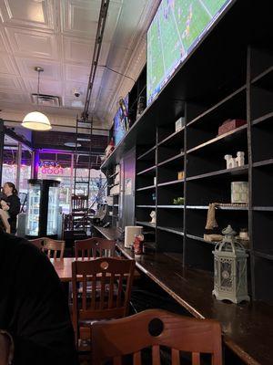 Interior with the old shelving and movable ladder that was used when this building was a hardware store back in the early 1900s.