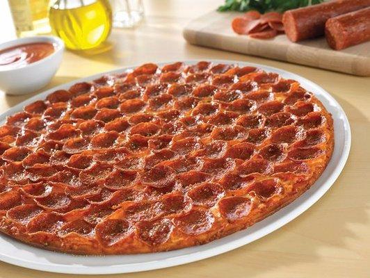 100 pieces of pep uniformly laid edge to edge.  Laid on the pizza correctly. This is something Donatos has always touted as a trademark.