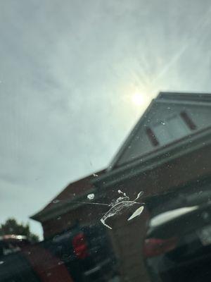 Cracked windshield identified within minutes of taking the car home and only less than 10 miles from the dealership.