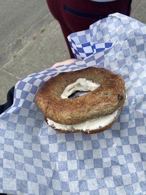 Cinnamon Raisin Bagel with medium spread plain cream cheese.