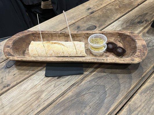 Fresh French Loaf With Dipping Oil, and Garlic Cheese Spread; with chocolates.