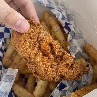 My son has learned the art of holding a DELICIOUS perfectly fried chicken strip and photographing it beautifully! Lol