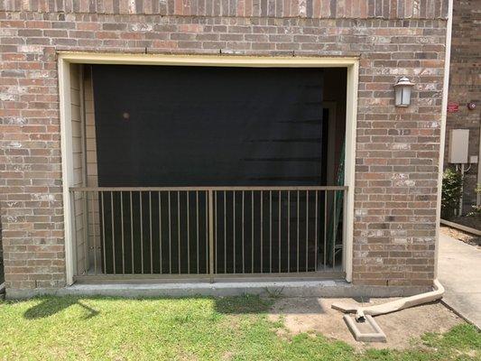 After installation picture of an apartment patio getting some much needed shade.