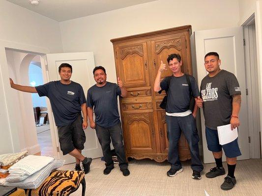 Omar and crew, with armoire that almost did not make it into the apartment due to its weight and size! No building or piece damage!!