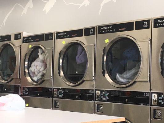 Stainless steel dryers and washer.