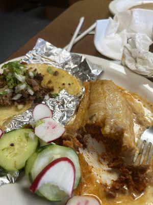 Half of my tamale and carnitas taco