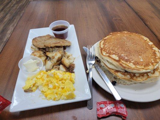 Blueberry pancakes, sausage, eggs, potatoes